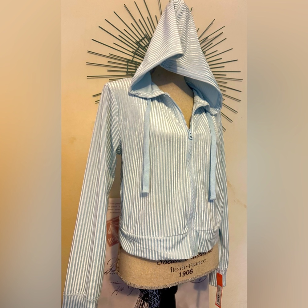 NWT Colsie size Small in an ice blue velour feel and two pockets on the side.